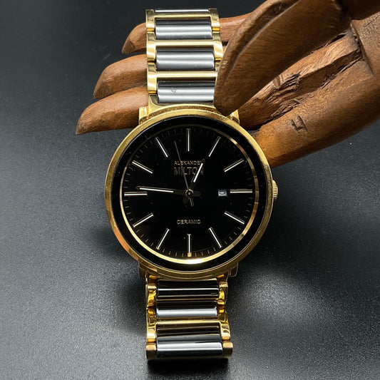 Gold-schwarze Alexander Milton Uhr