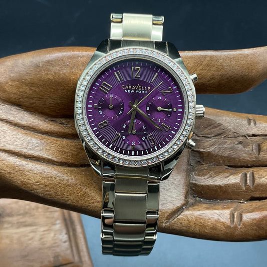 Gold-violette Caravelle Uhr