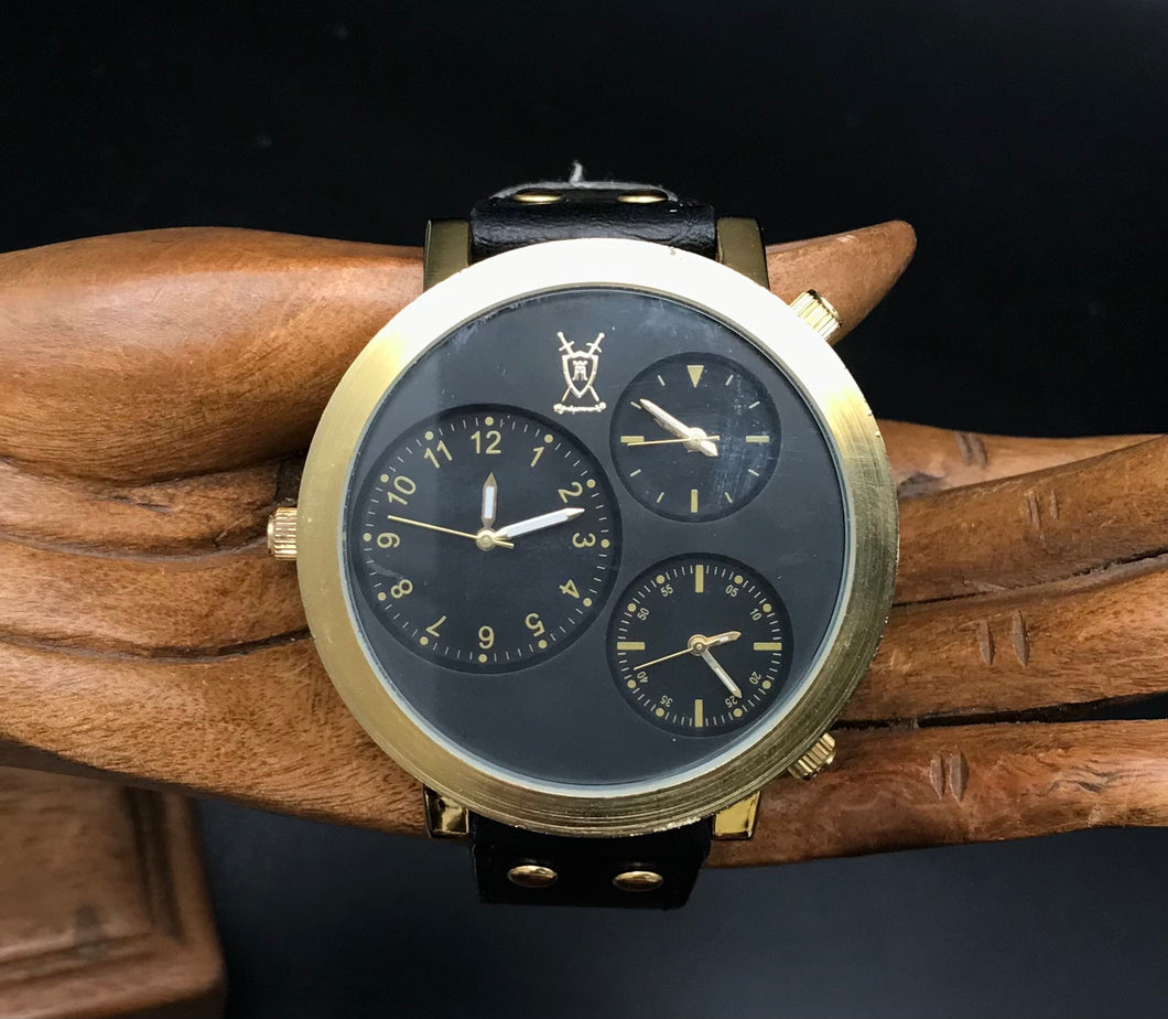 Gold-Schwarze Königswerk Uhr