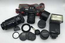 Lade das Bild in den Galerie-Viewer, Canon T70 Spiegelreflexkamera schwarz mit viel Zubehör und Tasche
